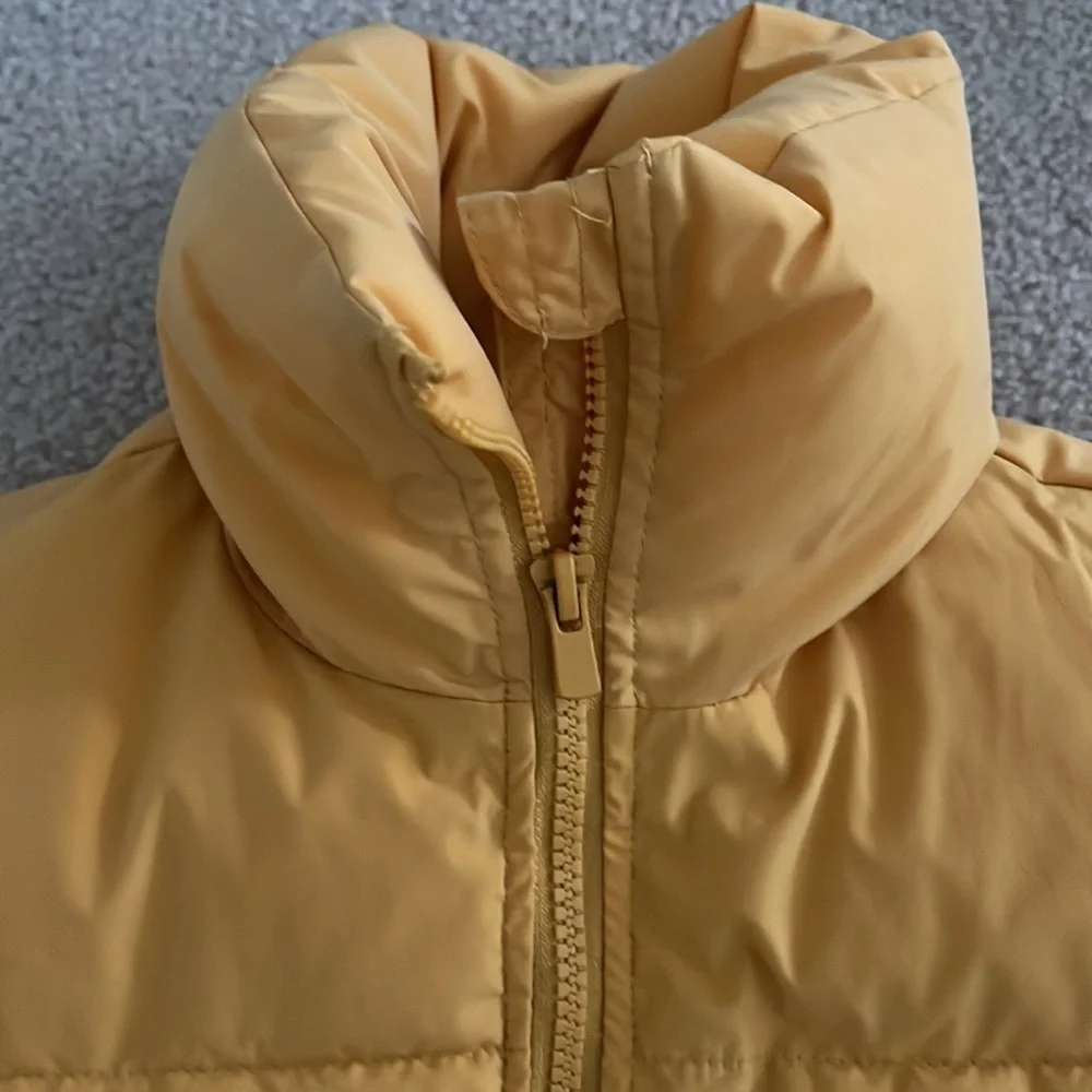 Yellow puffer jacket
